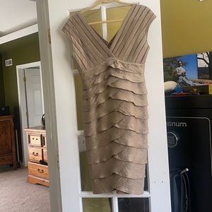 Women’s formal knee length dress.